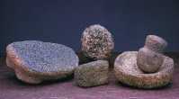 Stone Objects. Left: Tlatilco, State of Mexico. Upper and lower center: providence unknown. Metate; Izucar de Matamoros, Puebla. Mano; providence unknown. Formative