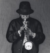 Miles Davis playing his trumpeta